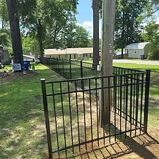 4-Foot-3-Rail-Black-Aluminum-Fence-Installation-on-Lake-Gantt 2