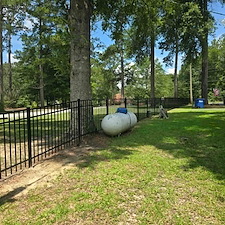 4-Foot-3-Rail-Black-Aluminum-Fence-Installation-on-Lake-Gantt 3