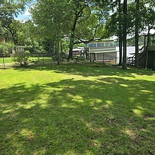 4-Foot-3-Rail-Black-Aluminum-Fence-Installation-on-Lake-Gantt 6