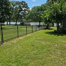 4-Foot-3-Rail-Black-Aluminum-Fence-Installation-on-Lake-Gantt 0