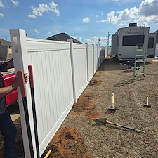 Large-Scale-Vinyl-Privacy-Fence-Installation-Serving-Century-FL 0