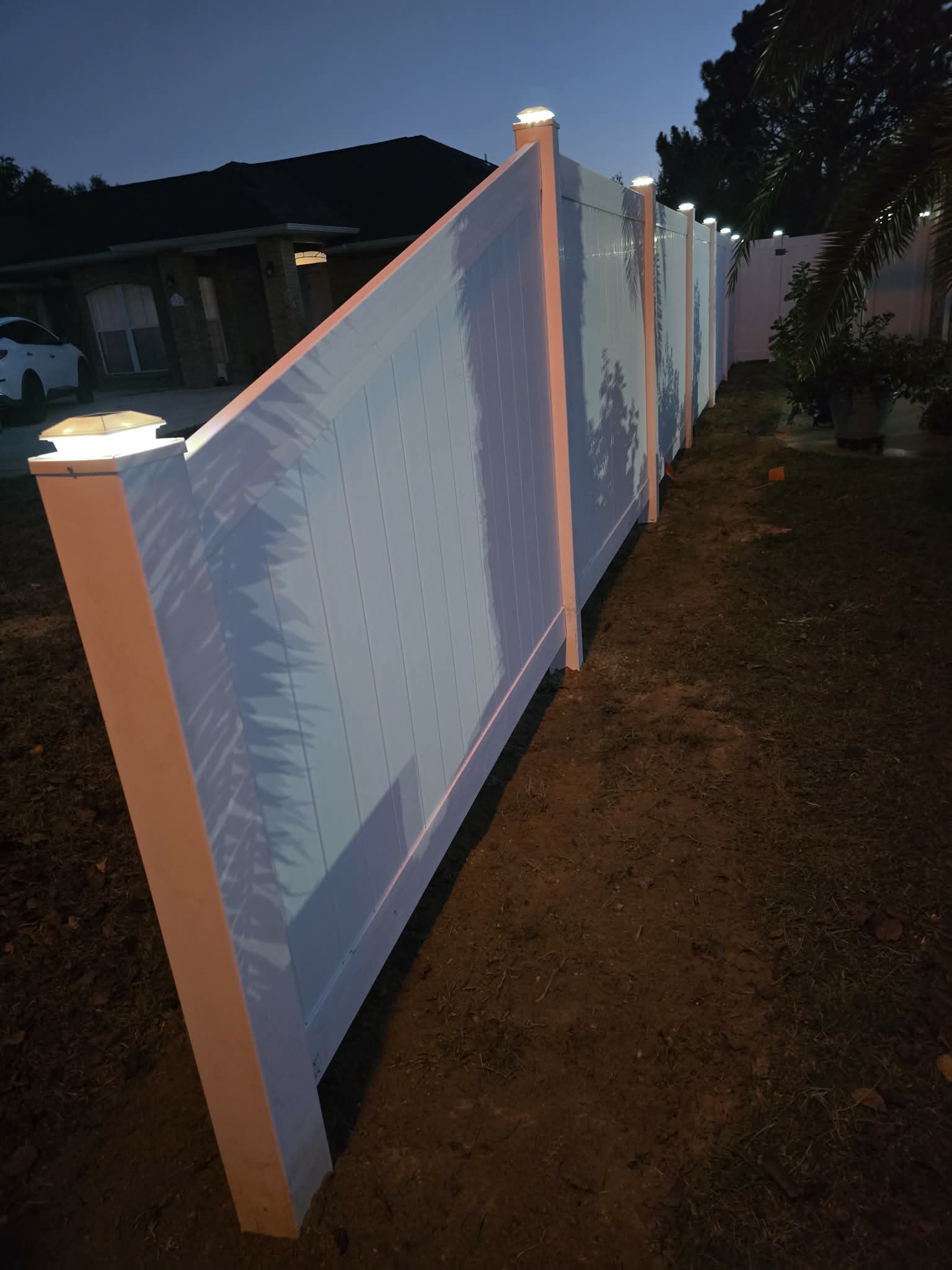 Premium Vinyl Privacy Fence with Integrated Post-Cap Lighting | Pensacola, FL
